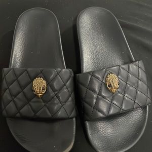 Kurt Geiger black and gold slides